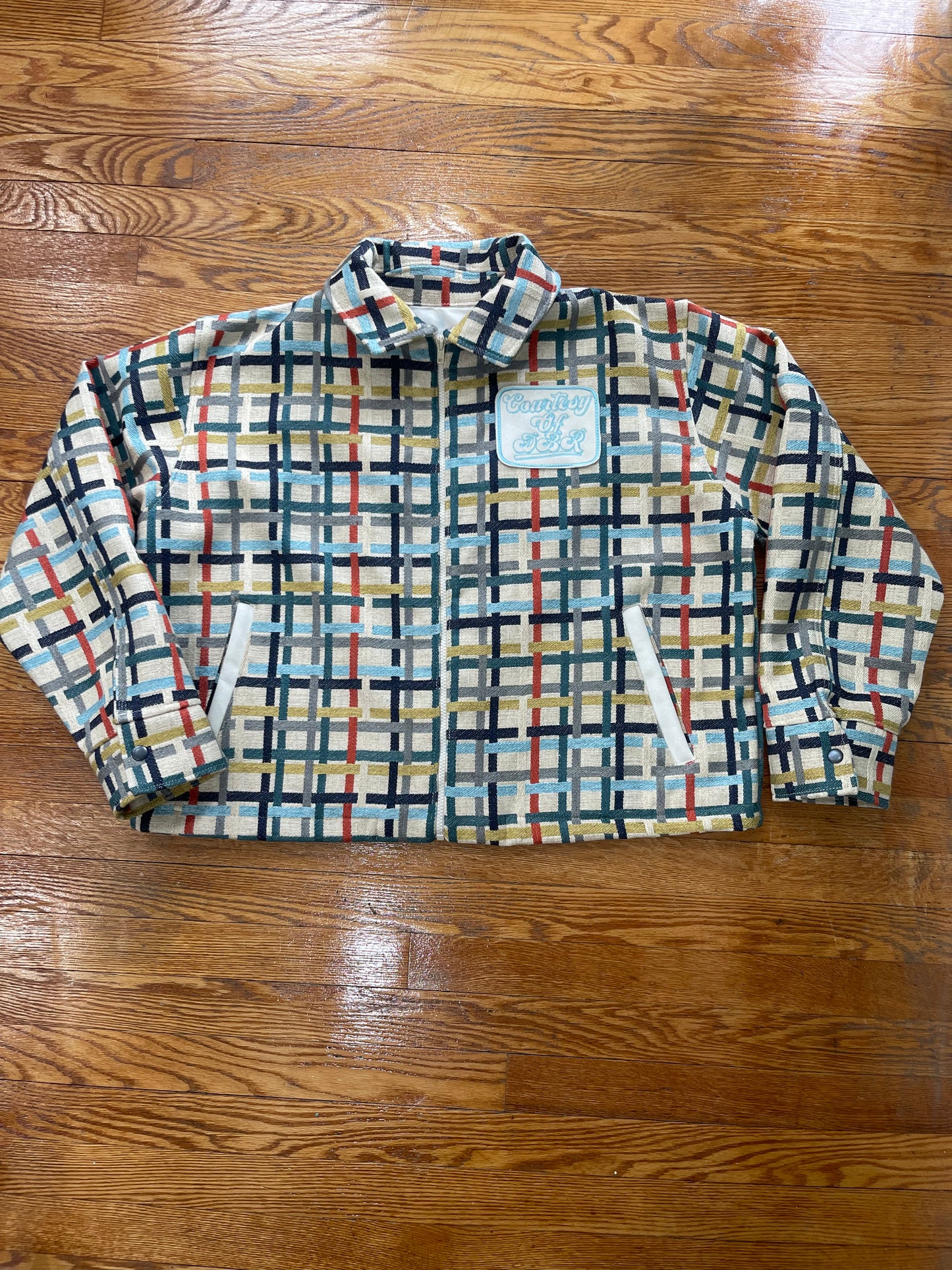 Multi colored jacket with DBR patch