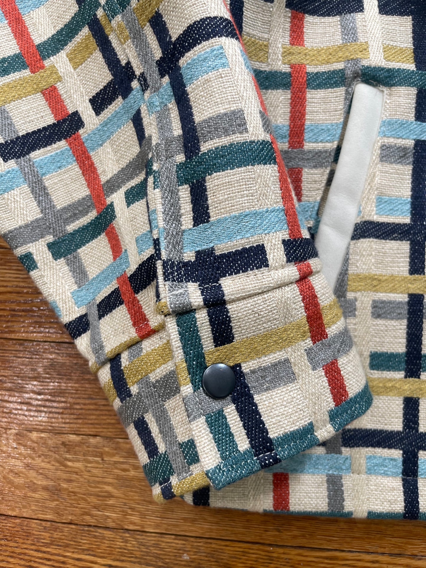 Multi colored jacket with DBR patch