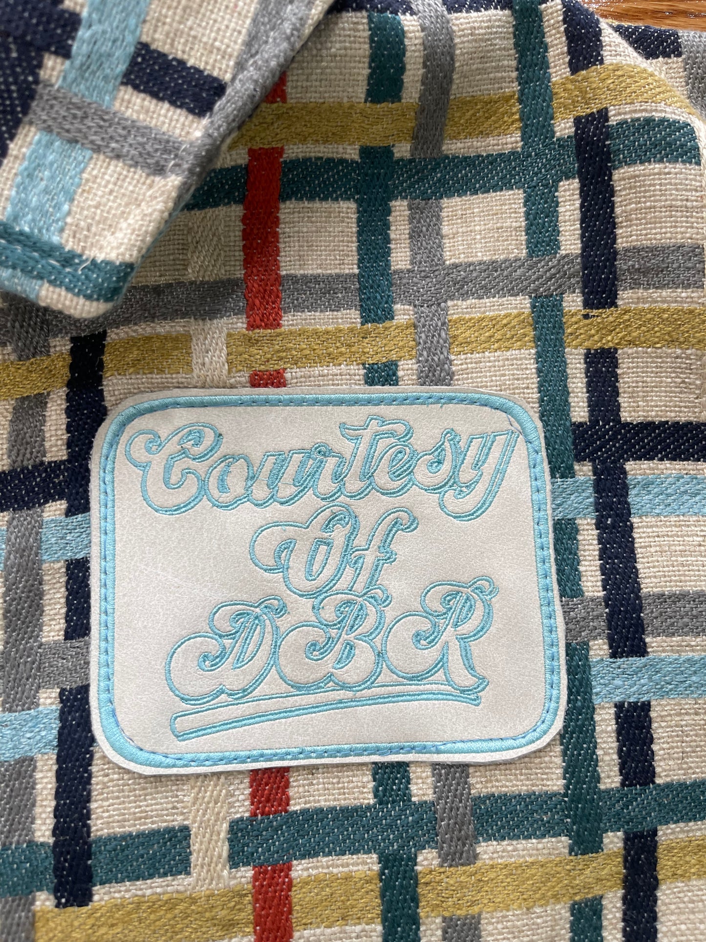 Multi colored jacket with DBR patch