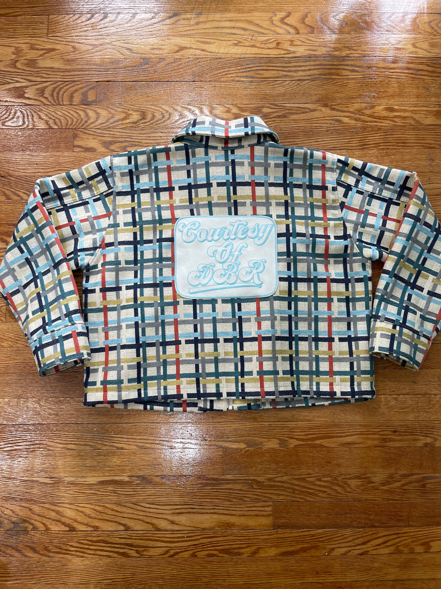 Multi colored jacket with DBR patch